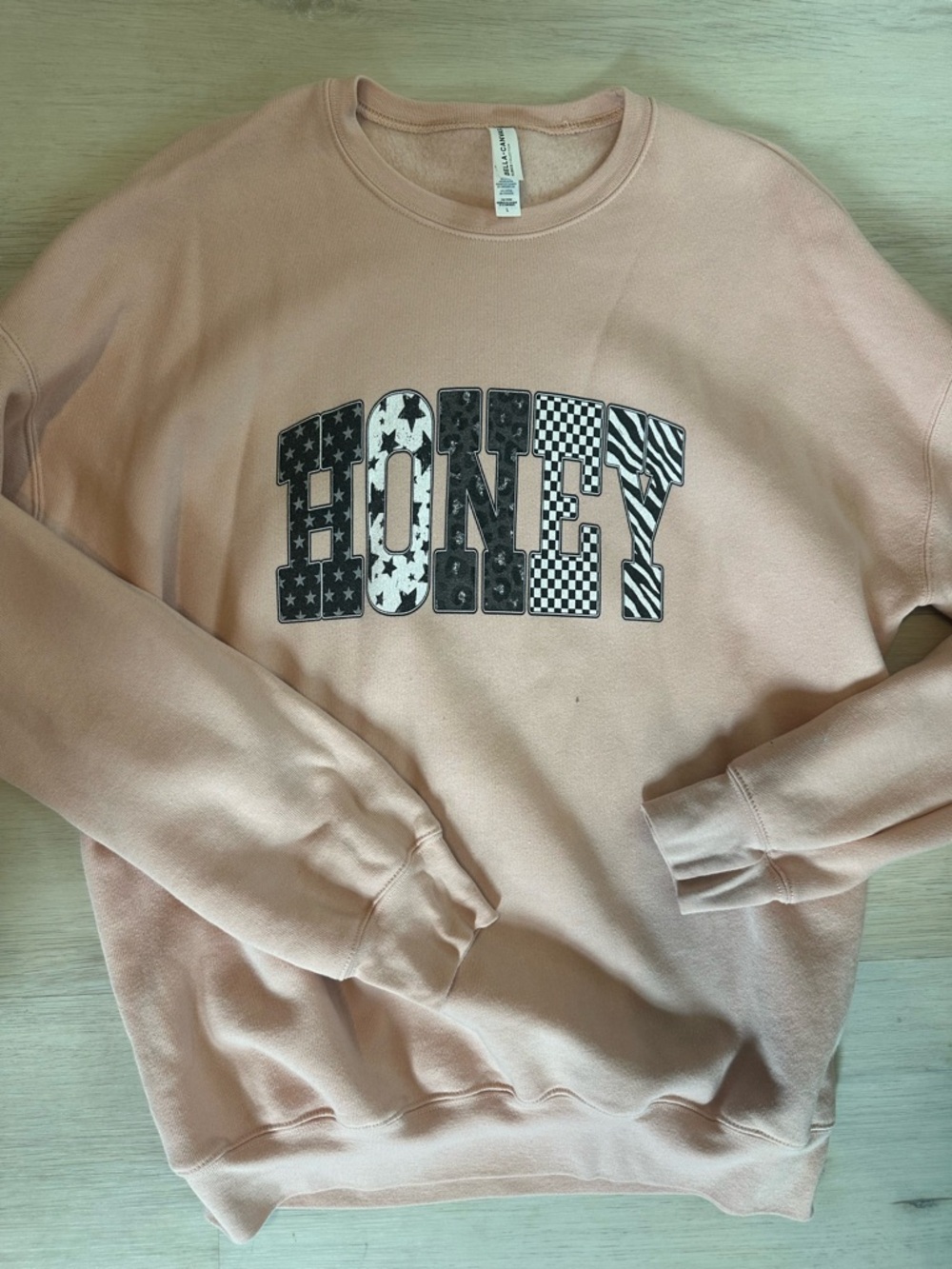 Bella Canvas Peach Crewneck Sweatshirt with 'HONEY' Graphic